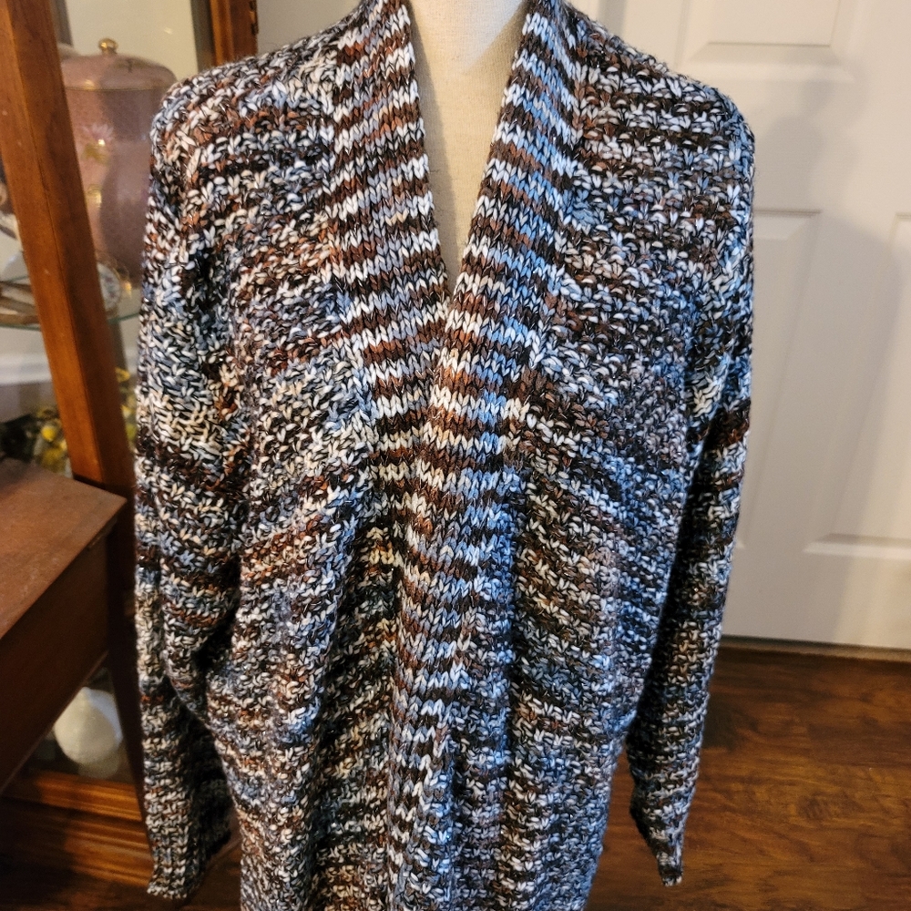 Avenue sweater size 26/28. New without tags.  Blue, brown, tan, and navy.